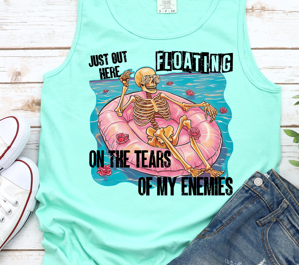 JUST OUT HERE FLOATING ON THE TEARS OF MY ENEMIES