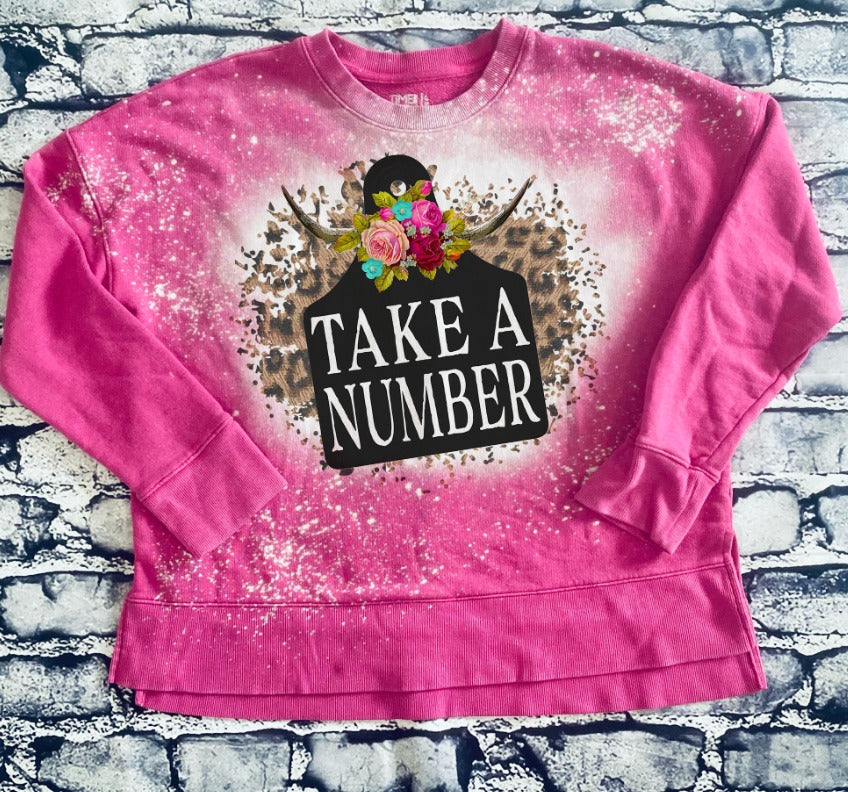 Take A Number Cow Tag on Leopard