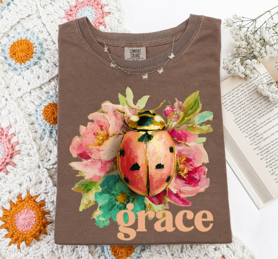 GRACE LADYBUG ON FLOWERS