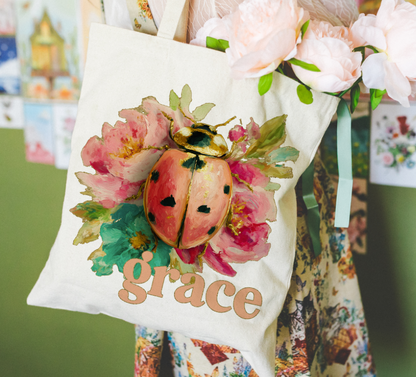 GRACE LADYBUG ON FLOWERS